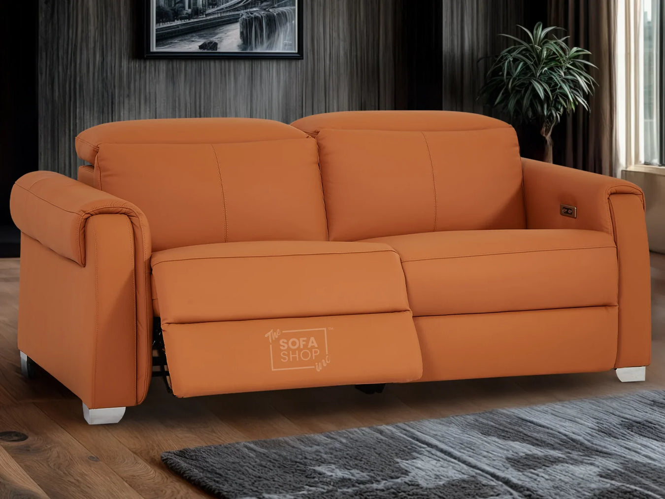 Orange leather power recliner sofa with adjustable headrest from The Sofa Shop